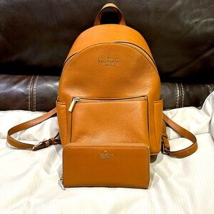 Kate Spade backpack with matching wallet.